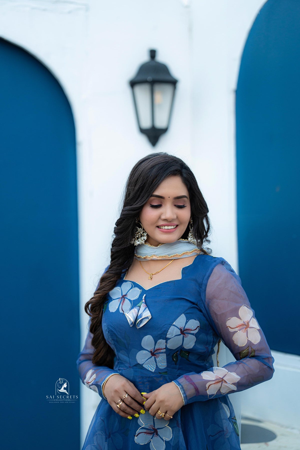 Sai Secrets Collections Women's Anarkali - Pavazhamali  FOIL PRINTED ORGANZA BLUE.