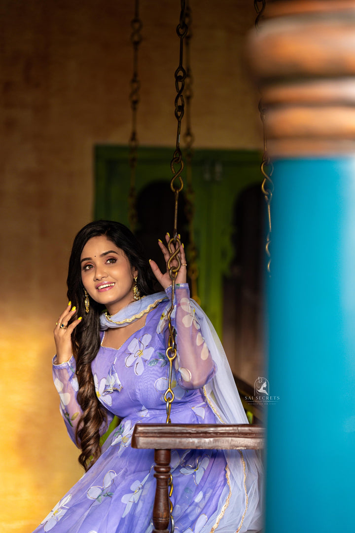 Sai Secrets Collections Women's  Anarkali - Pavazhamali MATERIAL-FOIL PRINTED ORGANZA - LAVENDER.